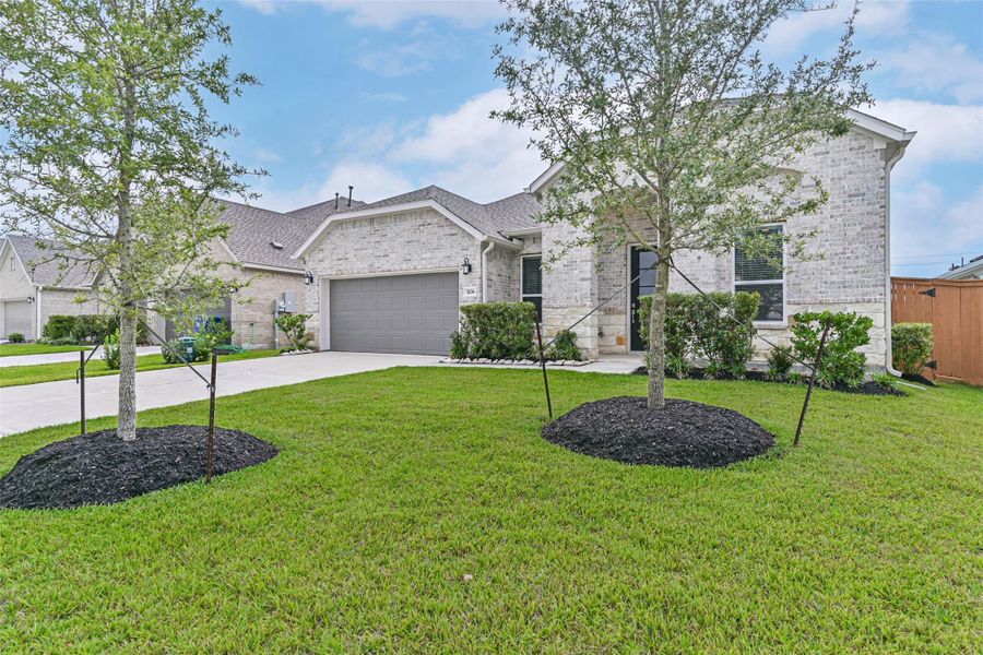 Front exterior of a new home in Lago Mar, Texas City, TX, highlighting curb appeal (Image 27).