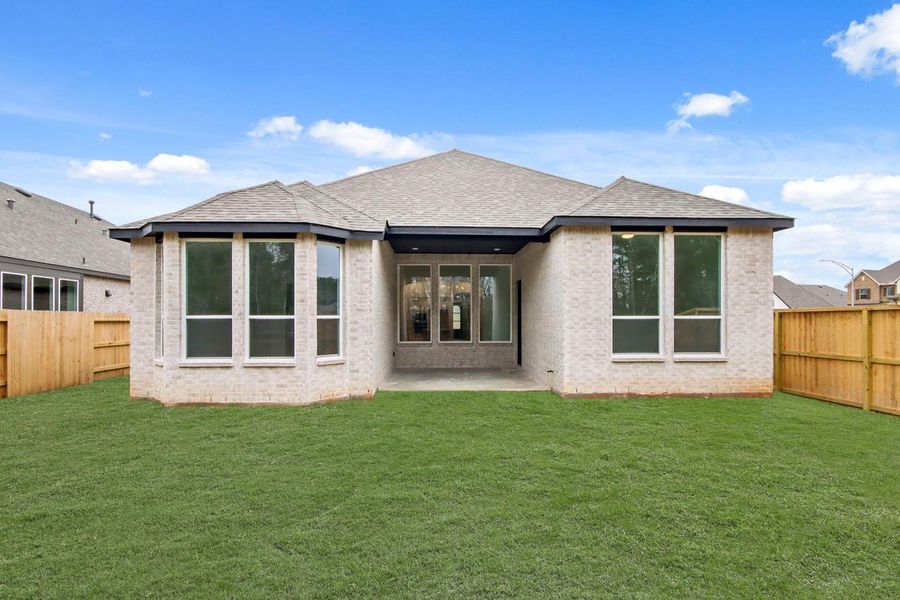Exterior details and patio area of a home in Grand Central Park, Conroe (Image 19). Exterior details and patio area of a home in Grand Central Park, Conroe (Image 19).