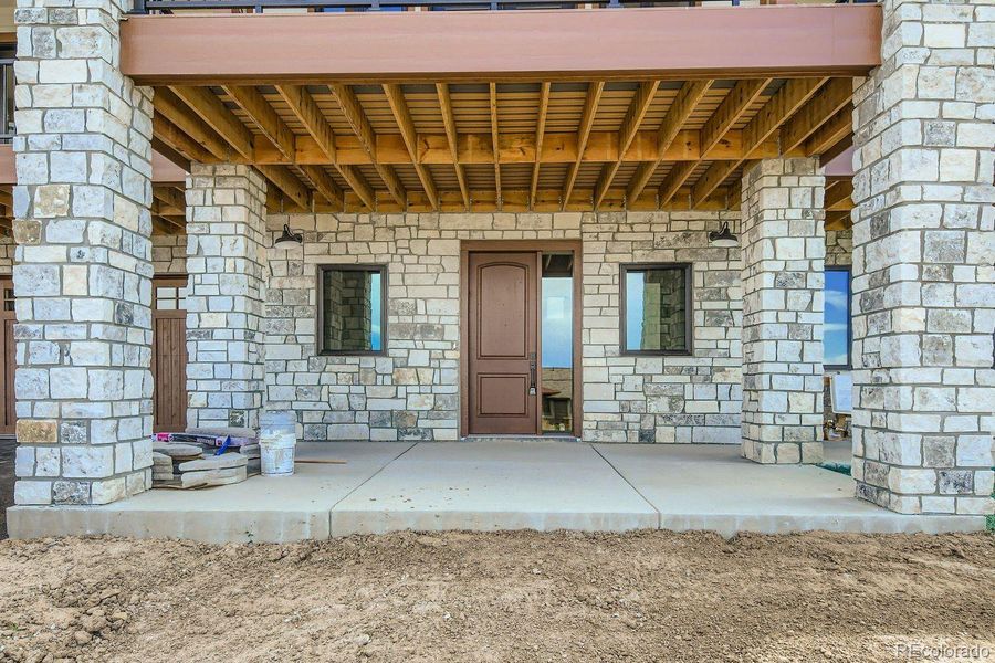 Exterior details and patio area of a home in , Granby (Image 2).