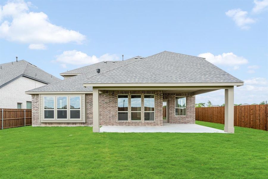 Front exterior of a new home in The Oaks, Red Oak, TX, highlighting curb appeal (Image 22). Front exterior of a new home in The Oaks, Red Oak, TX, highlighting curb appeal (Image 22).