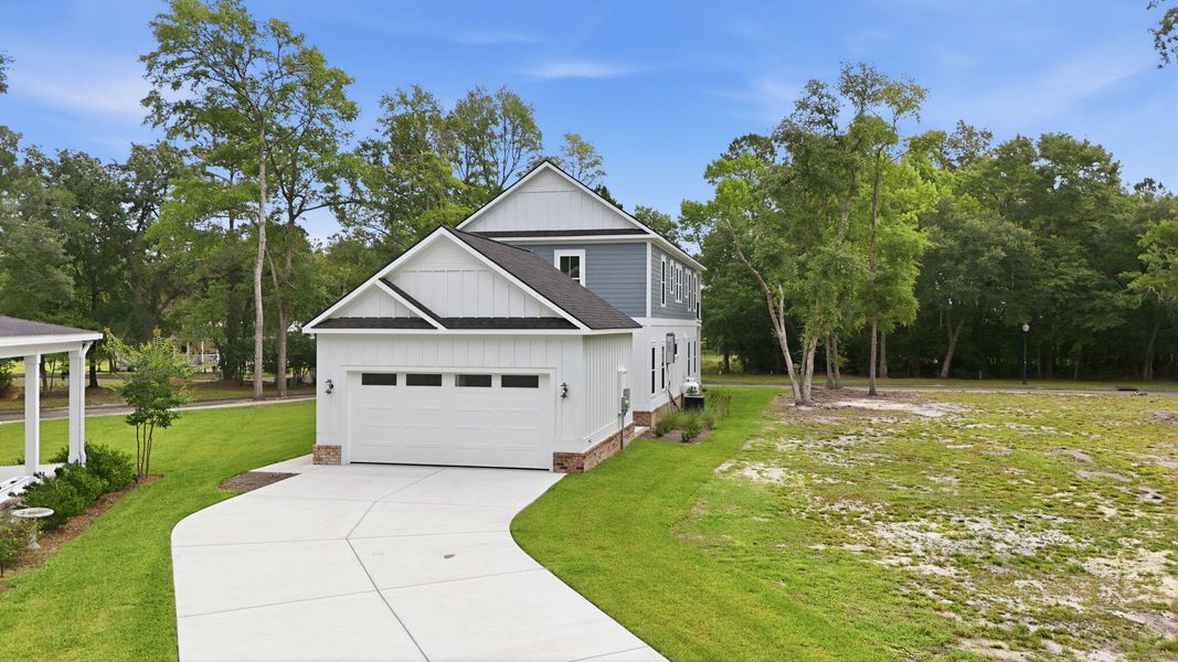 Front exterior of a new home in , Georgetown, SC, highlighting curb appeal (Image 30). Front exterior of a new home in , Georgetown, SC, highlighting curb appeal (Image 30).