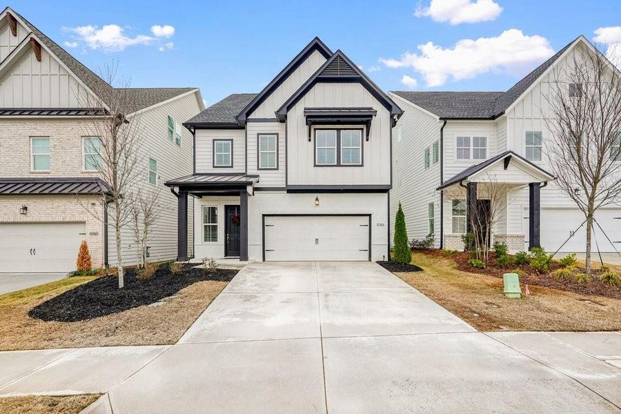 Front exterior of a new home in , Canton, GA, highlighting curb appeal (Image 23). Front exterior of a new home in , Canton, GA, highlighting curb appeal (Image 23).