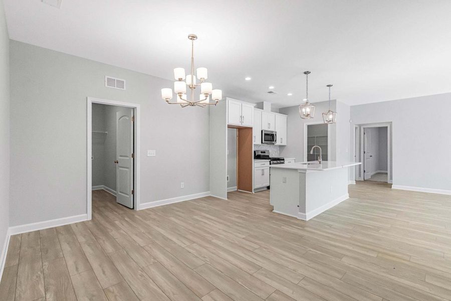 Representative unfurnished interior of a home built from the Weymouth by Caviness & Cates Communities in Bartlett Manor, Youngsville (Image 108).