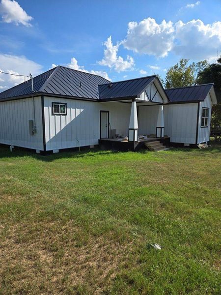 Front exterior of a new home in , Gonzales, TX, highlighting curb appeal (Image 13).