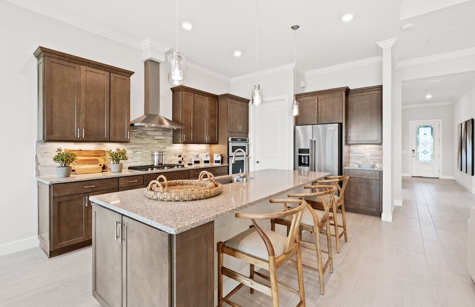 Kitchen With Designer Finishes And Large Center Island Kitchen With Designer Finishes And Large Center Island