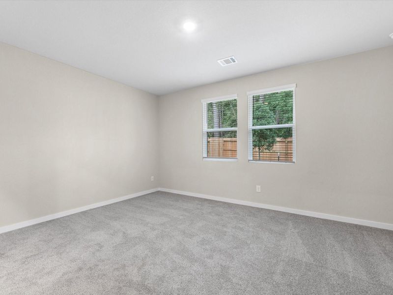 Spacious, unfurnished interior of a new home in Montgomery Oaks - Premier, Conroe (Image 14).