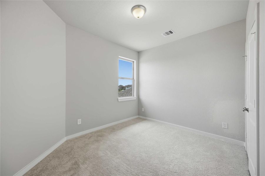 Spacious, unfurnished interior of a new home in Sunterra 40, Katy (Image 13).