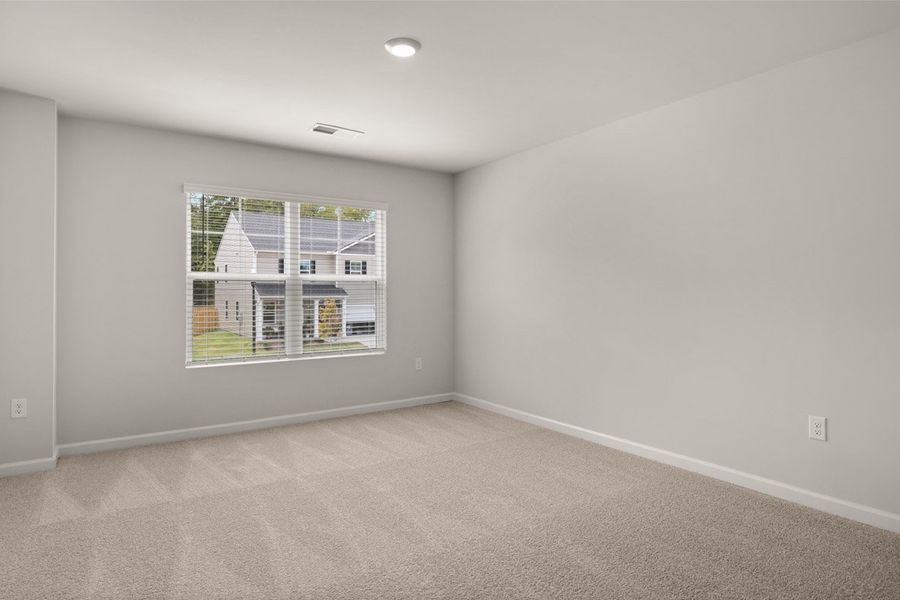 Representative unfurnished interior of a home built from the Mansfield by D.R. Horton in Southwind Village, Evans (Image 35).