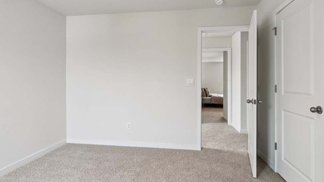 Spacious, unfurnished interior of a new home in Reedy Creek Preserve, Charlotte (Image 21).