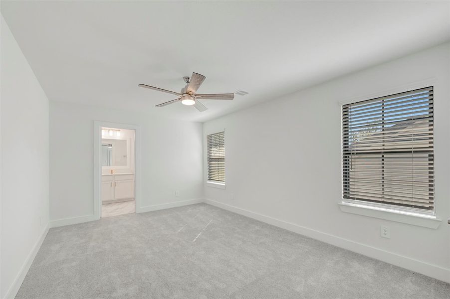 Spacious, unfurnished interior of a new home in The Oaks on 6th Street, Magnolia (Image 24).