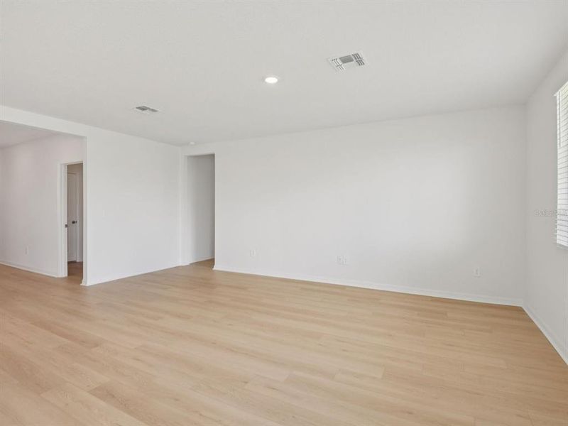 Spacious, unfurnished interior of a new home in The Grove at Stuart Crossing - Classic Series, Bartow (Image 15).