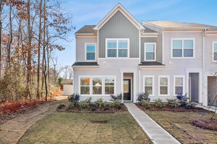 Front exterior of a new home in Lakeview Village, Charlotte, NC, highlighting curb appeal (Image 1). Front exterior of a new home in Lakeview Village, Charlotte, NC, highlighting curb appeal (Image 1).