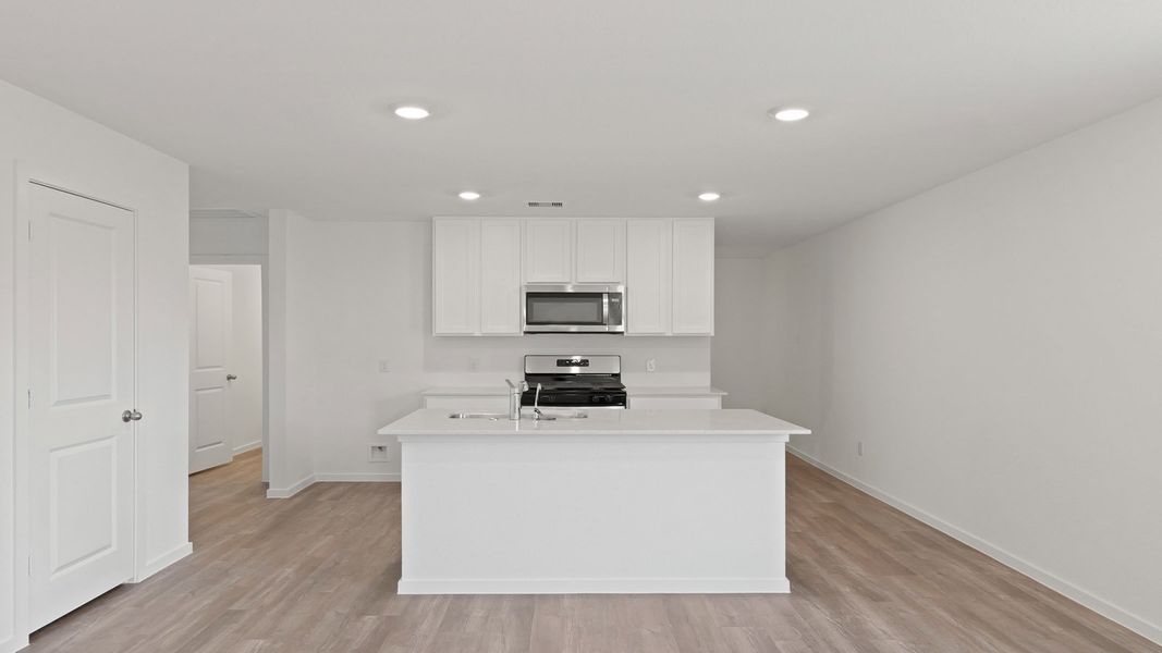 Representative furnished interior of a home built from the Plan by D.R. Horton in Lexington Heights, Willis (Image 5).