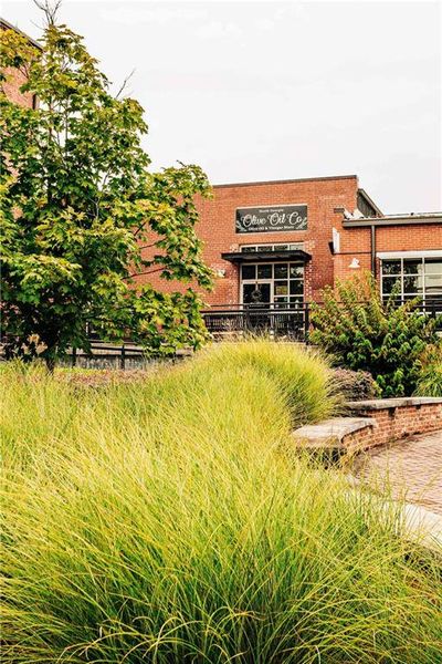Front exterior of a new home in Rosewood Lake Estates, Hoschton, GA, highlighting curb appeal (Image 67).