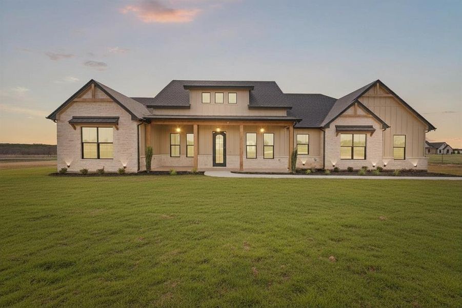 Front exterior of a new home in , Godley, TX, highlighting curb appeal (Image 1). Front exterior of a new home in , Godley, TX, highlighting curb appeal (Image 1).