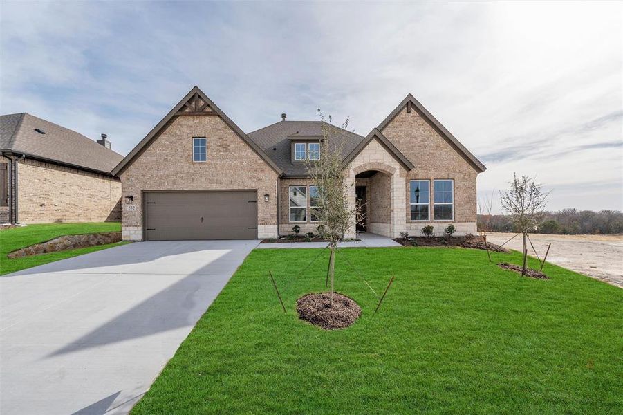 Front exterior of a new home in Waterford Park, Weatherford, TX, highlighting curb appeal (Image 24).