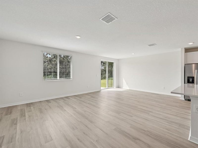 Spacious, unfurnished interior of a new home in The Reserve at Van Oaks, Auburndale (Image 19).
