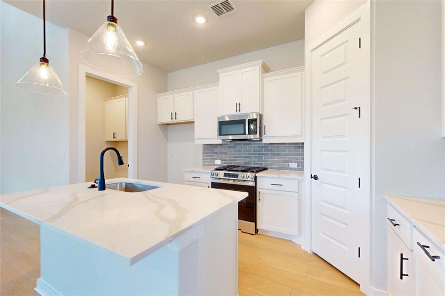 Furnished interior view inside a new home in Cedar Brook, Leander (Image 6).