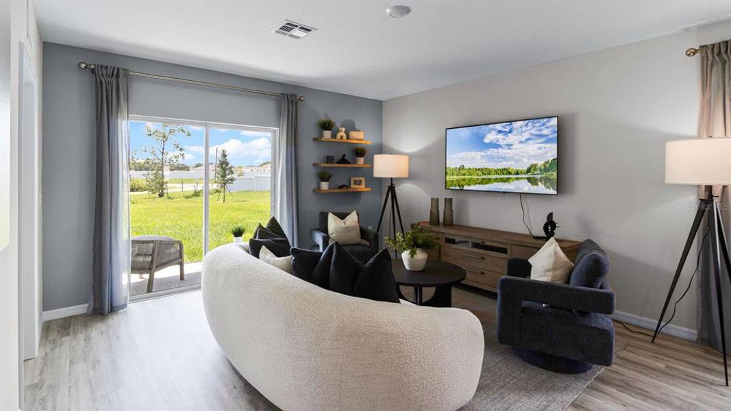Furnished interior view inside a new home in Harmony at Lake Eloise, Winter Haven (Image 11).