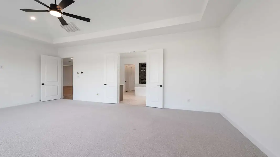 Spacious, unfurnished interior of a new home in Creek of Driftwood, Driftwood (Image 18).