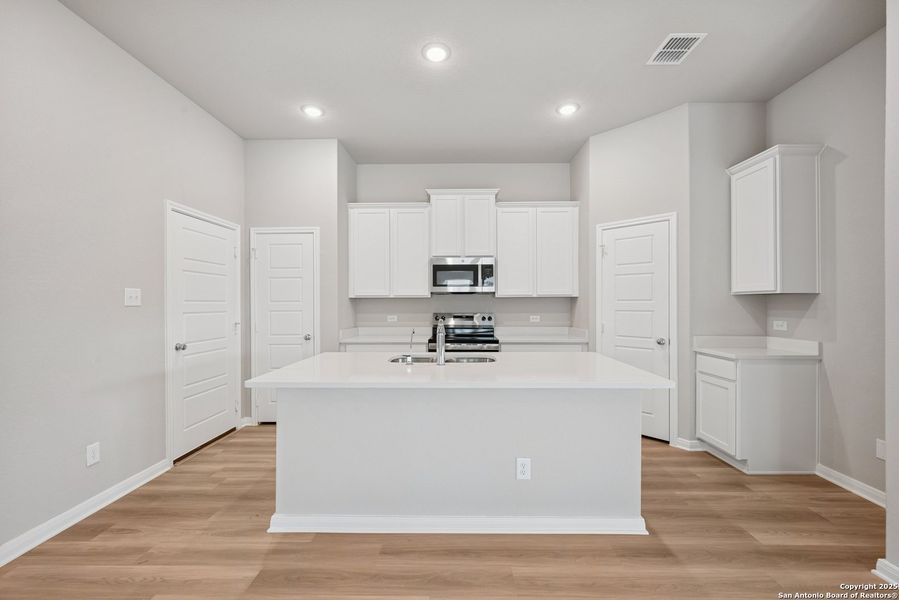 Furnished interior view inside a new home in Greenspoint Heights, Seguin (Image 5).