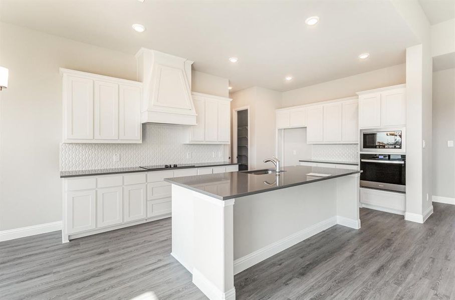 Furnished interior view inside a new home in Ten Mile Creek Estates, DeSoto (Image 7).