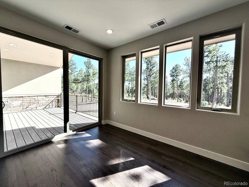 Dining Area walks out to Covered Deck. Dining Area walks out to Covered Deck.