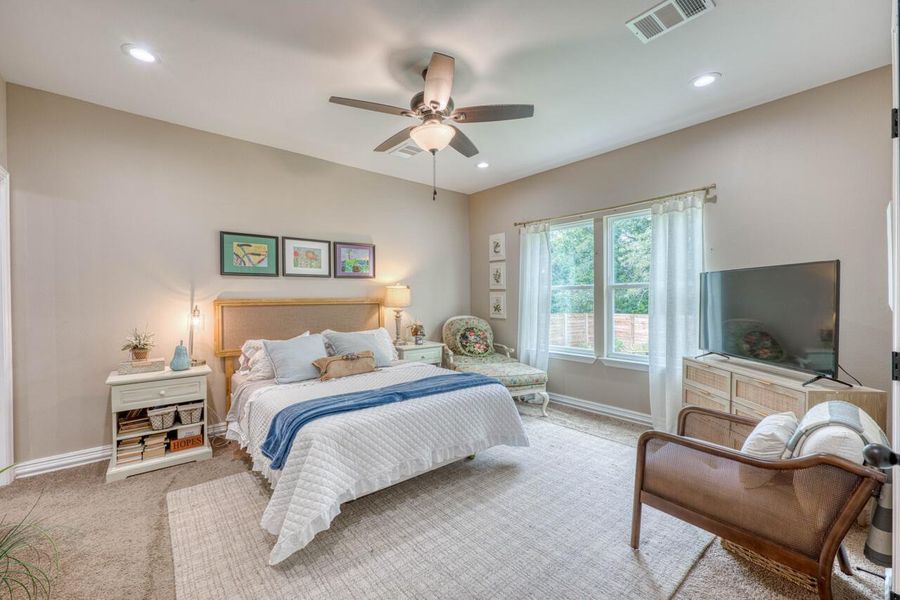Recessed lighting and ceiling fan overhead