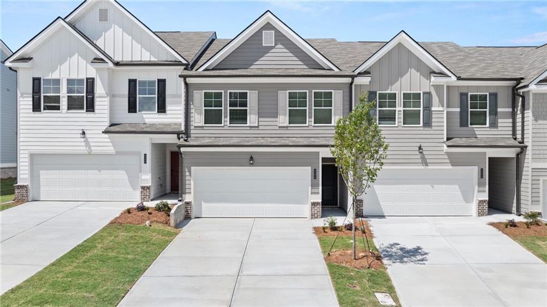 Front exterior of a new home in Sandtown Falls, Atlanta, GA, highlighting curb appeal (Image 1). Front exterior of a new home in Sandtown Falls, Atlanta, GA, highlighting curb appeal (Image 1).