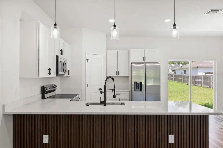 Furnished interior view inside a new home in , Ocala (Image 7).