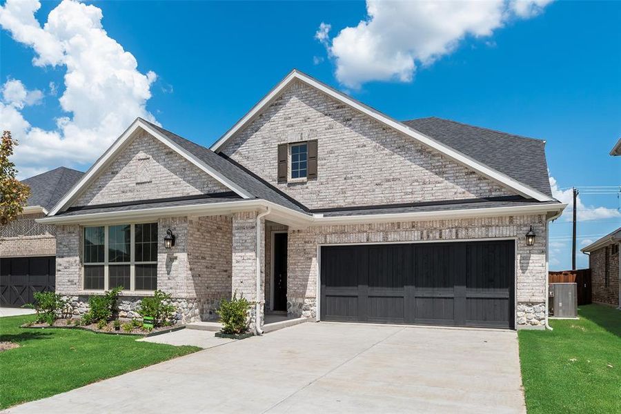 Front exterior of a new home in Arbors at Legacy Hills, Celina, TX, highlighting curb appeal (Image 20). Front exterior of a new home in Arbors at Legacy Hills, Celina, TX, highlighting curb appeal (Image 20).