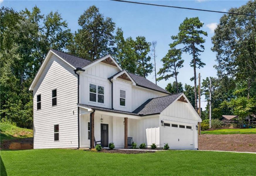 Front exterior of a new home in , Cumming, GA, highlighting curb appeal (Image 32).