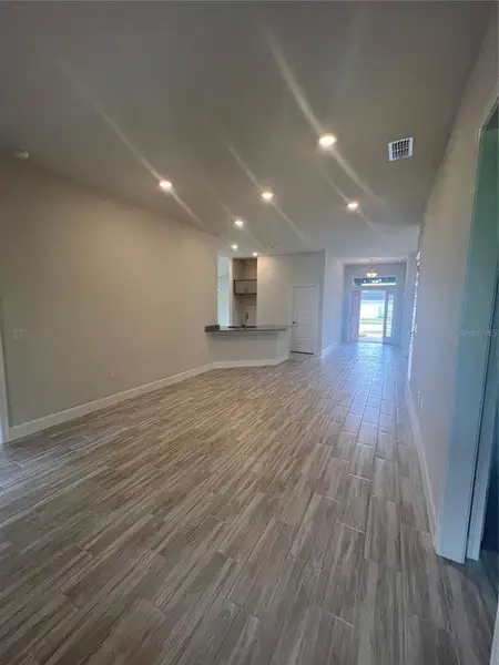 Spacious, unfurnished interior of a new home in Abbey Glen, Dade City (Image 13).