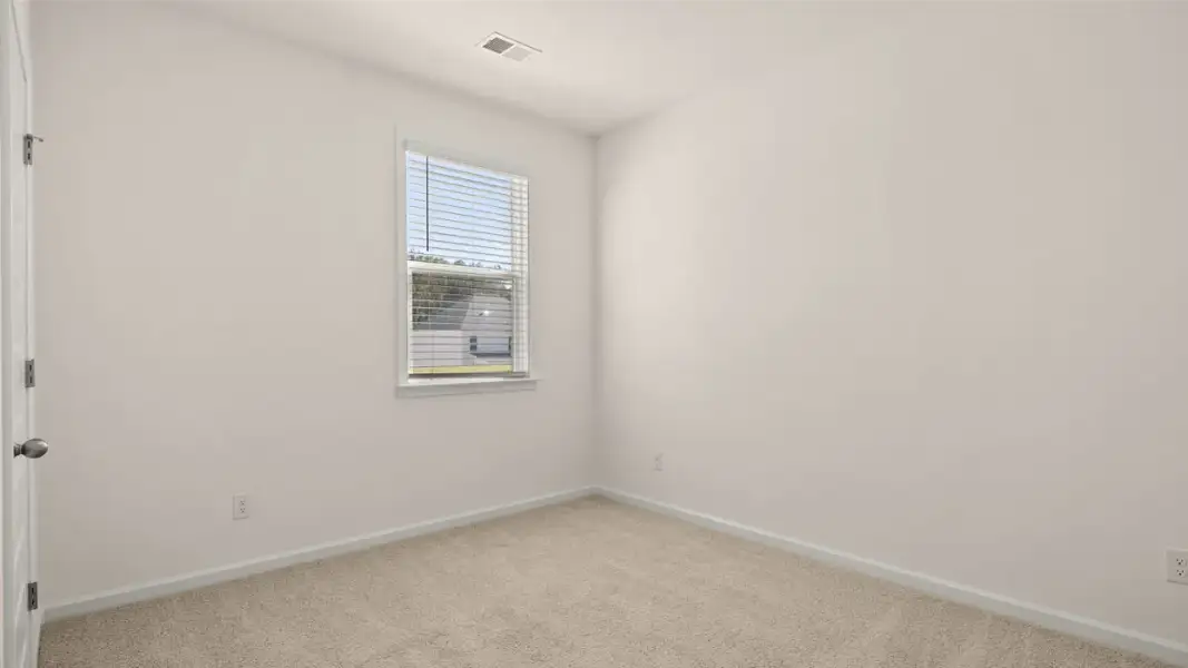 Spacious, unfurnished interior of a new home in The Highlands at Cedar Hill Landing, Navassa (Image 15).
