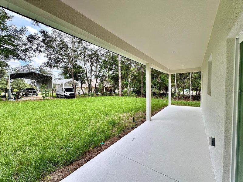 Exterior details and patio area of a home in , Citrus Springs (Image 24).