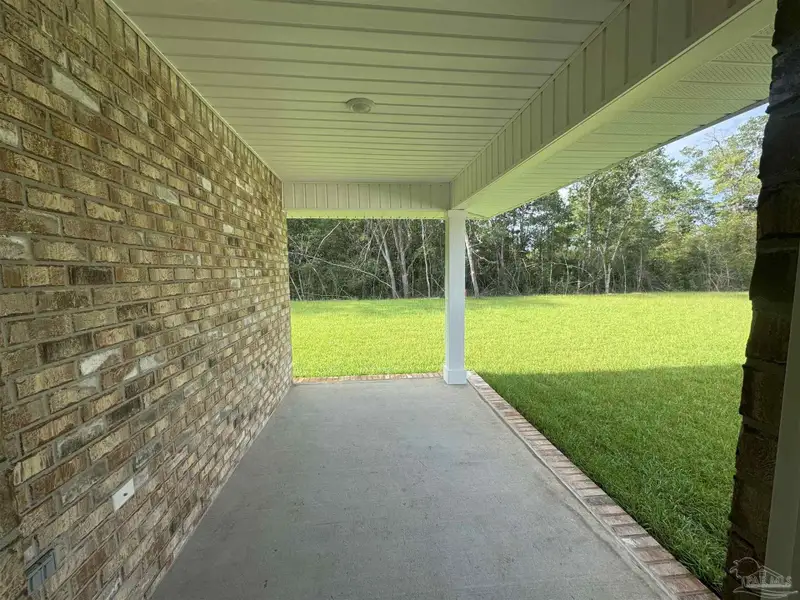 Exterior details and patio area of a home in Hidden Pines Estates, Milton (Image 2). Exterior details and patio area of a home in Hidden Pines Estates, Milton (Image 2).