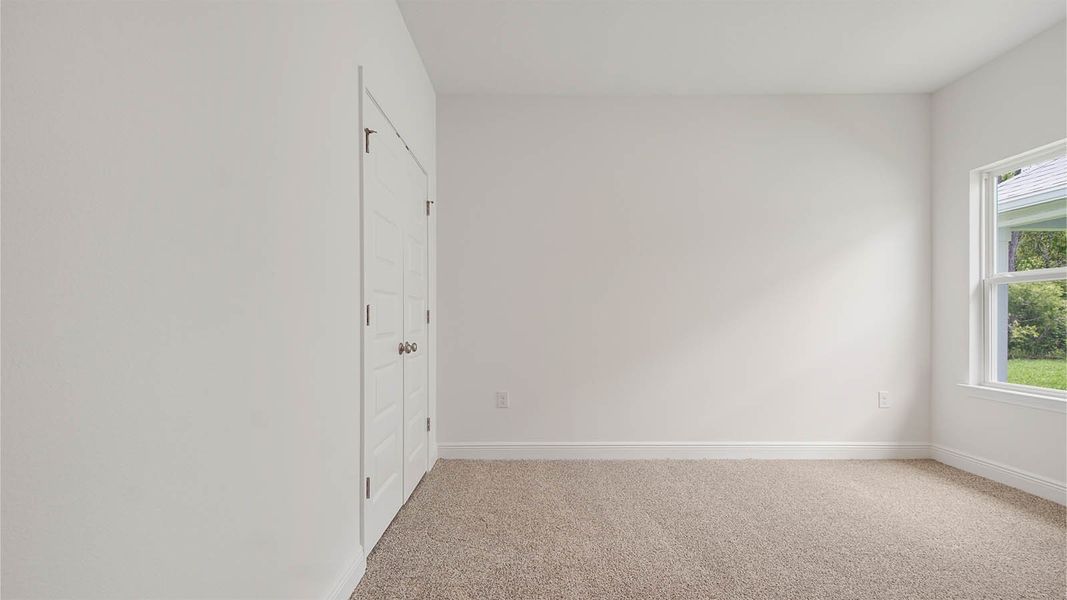 Representative unfurnished interior of a home built from the Kennedy by D.R. Horton in Bayside at Ward Creek, Panama City Beach (Image 38).