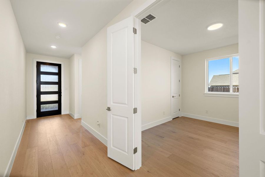 Spacious, unfurnished interior of a new home in Blackhawk in Pflugerville, Pflugerville (Image 24).