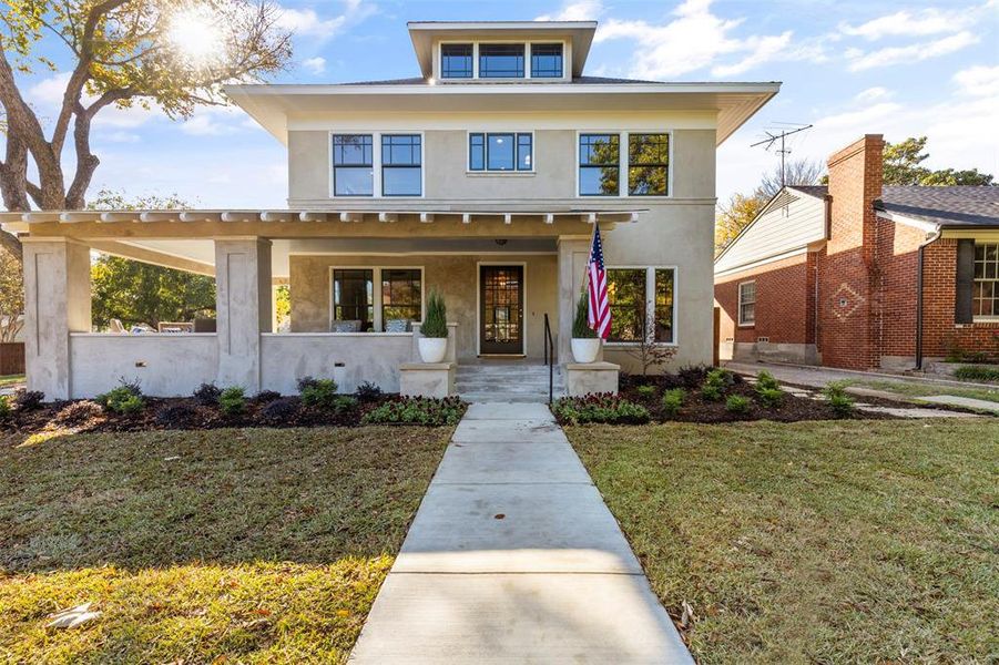 View of front of home with a front lawn