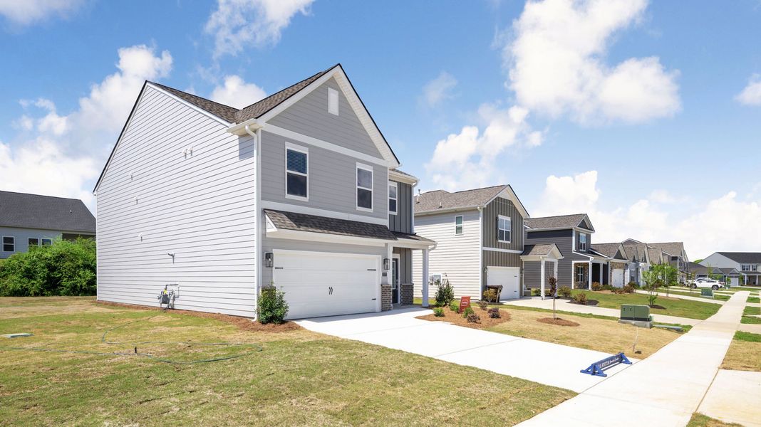 Front exterior of a new home in Prairie Pass, Apison, TN, highlighting curb appeal (Image 2).