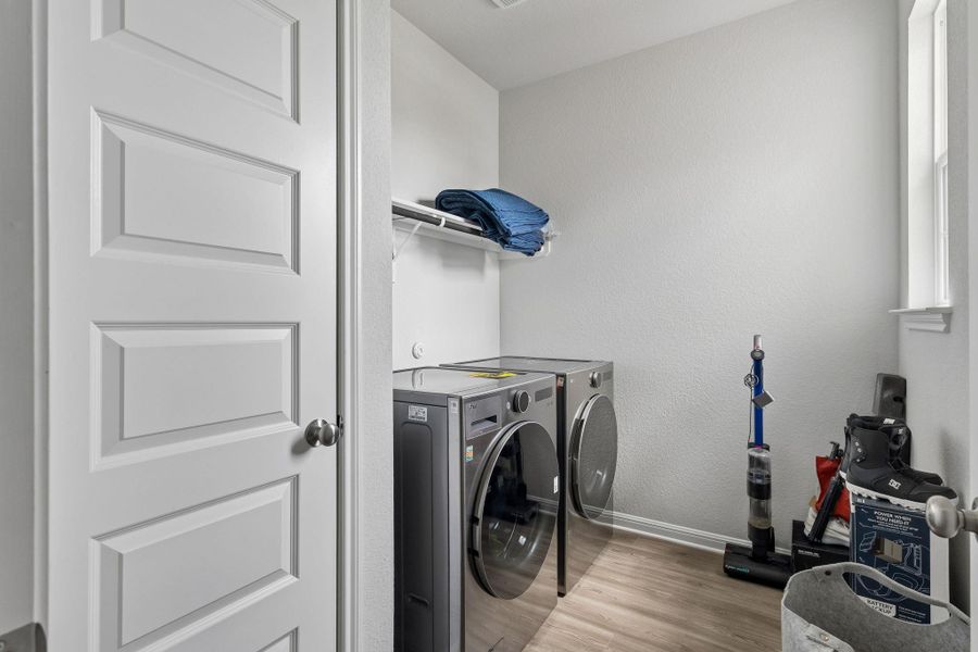 Furnished interior view inside a new home in Stallion Run, Buda (Image 18).