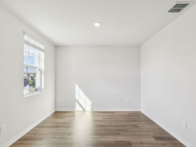 Spacious, unfurnished interior of a new home in The Meadow at Crossprairie, St. Cloud (Image 9).