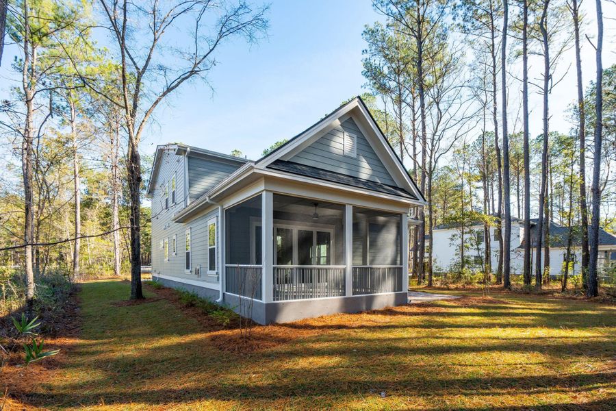 Exterior details and patio area of a home in , Awendaw (Image 40).