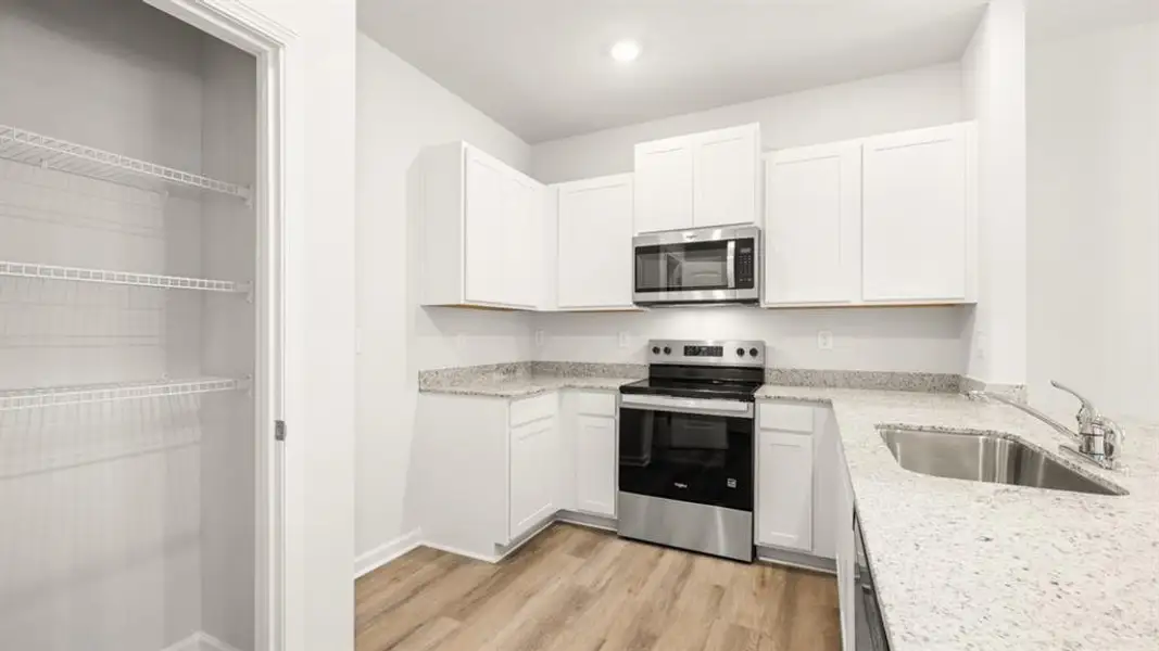 Furnished interior view inside a new home in Roseleigh Park, Douglasville (Image 6).