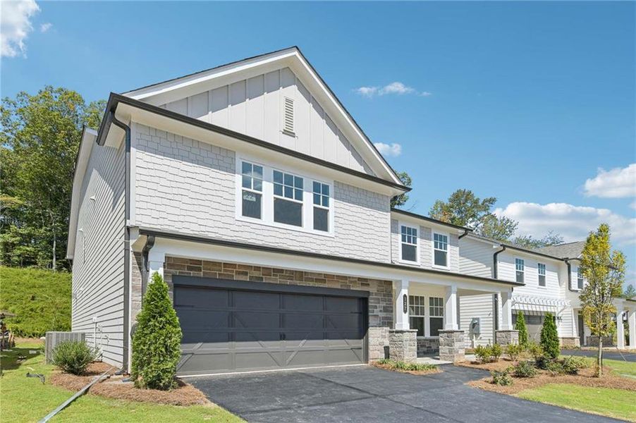 Front exterior of a new home in Creekside, Dawsonville, GA, highlighting curb appeal (Image 2).