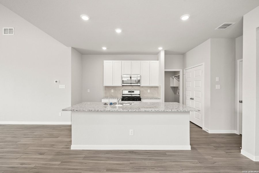 Furnished interior view inside a new home in Hickory Ridge, Elmendorf (Image 6).