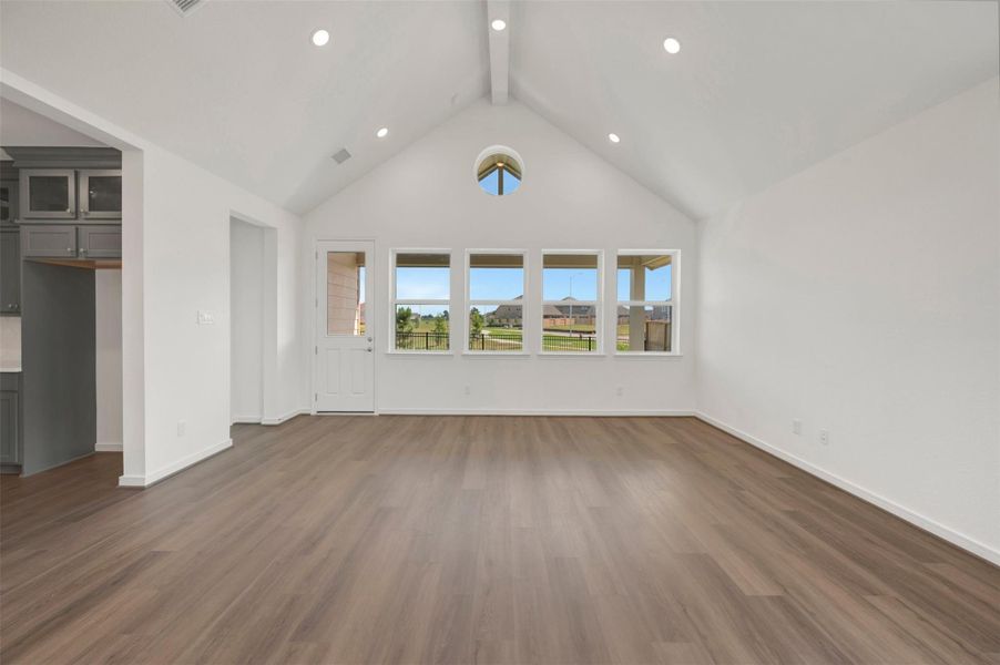 Open great room with high vaulted ceilings