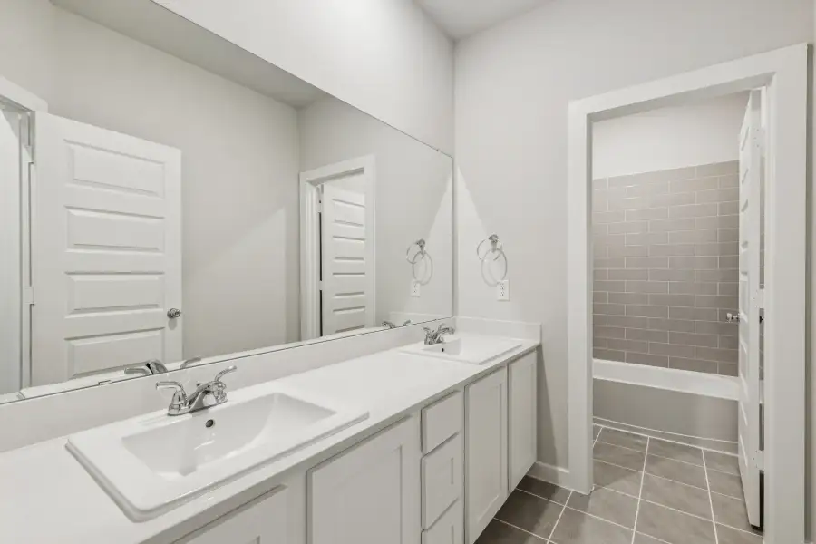 Bathroom in the Winters home plan by Trophy Signature Homes – REPRESENTATIVE PHOTO