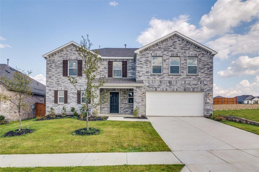 Front exterior of a new home in Heartland Signature, Crandall, TX, highlighting curb appeal (Image 2). Front exterior of a new home in Heartland Signature, Crandall, TX, highlighting curb appeal (Image 2).