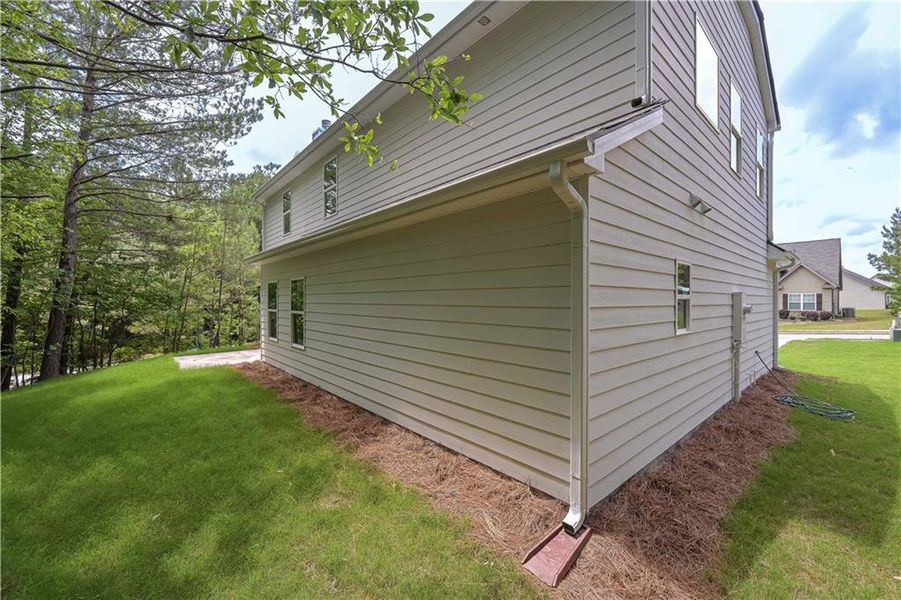 Front exterior of a new home in , Villa Rica, GA, highlighting curb appeal (Image 18). Front exterior of a new home in , Villa Rica, GA, highlighting curb appeal (Image 18).
